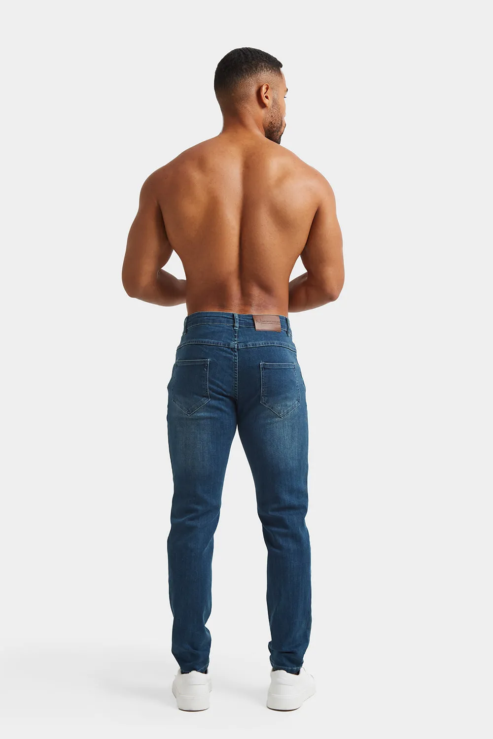 Athletic Fit Jeans in Mid Blue
